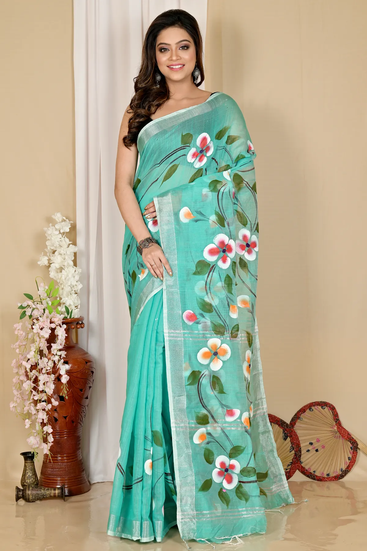 DipDiya Blended Cotton See Green Tanikato Masterfully Woven Hand Painted Sarees