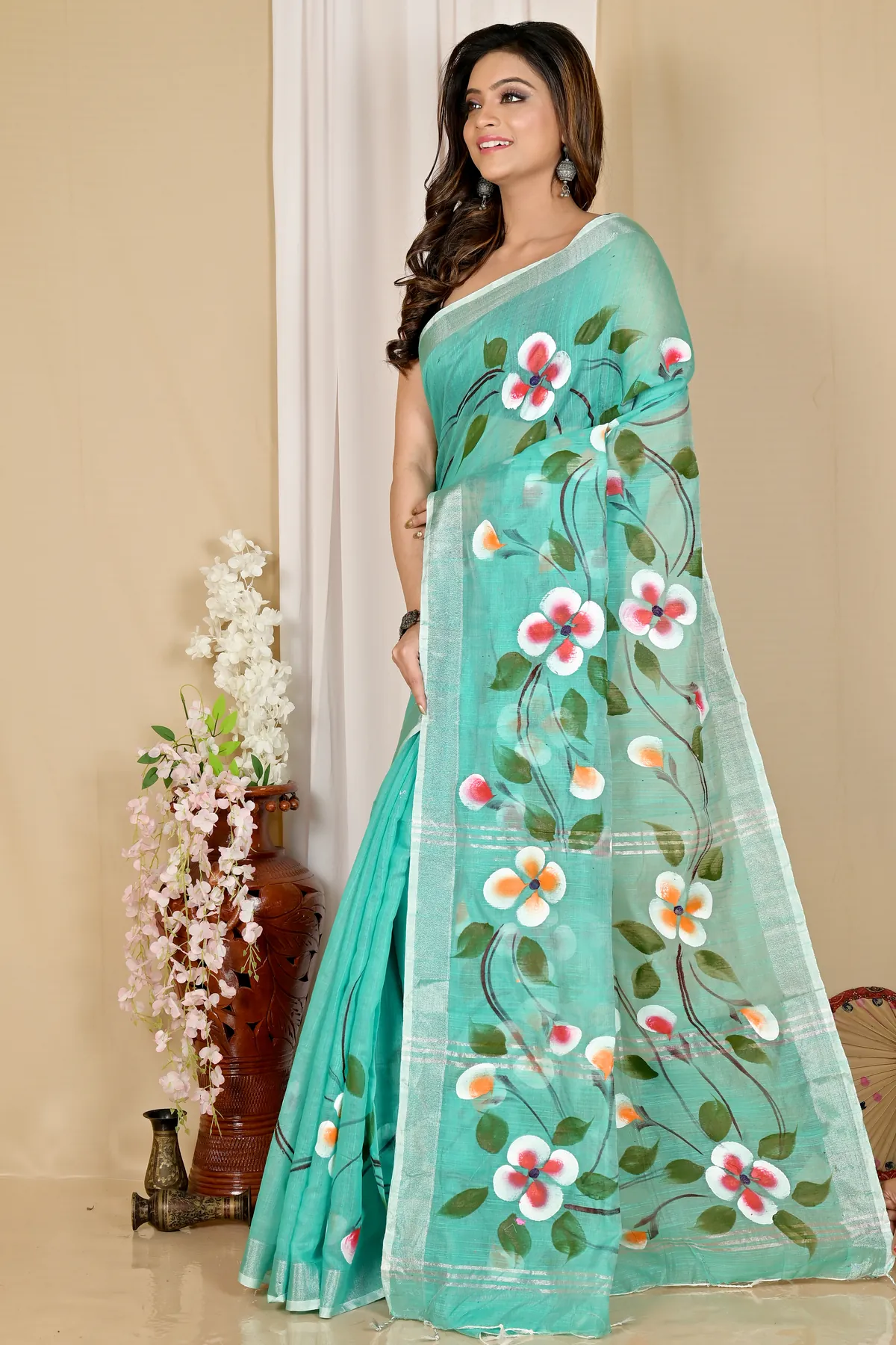 DipDiya Blended Cotton See Green Tanikato Masterfully Woven Hand Painted Sarees