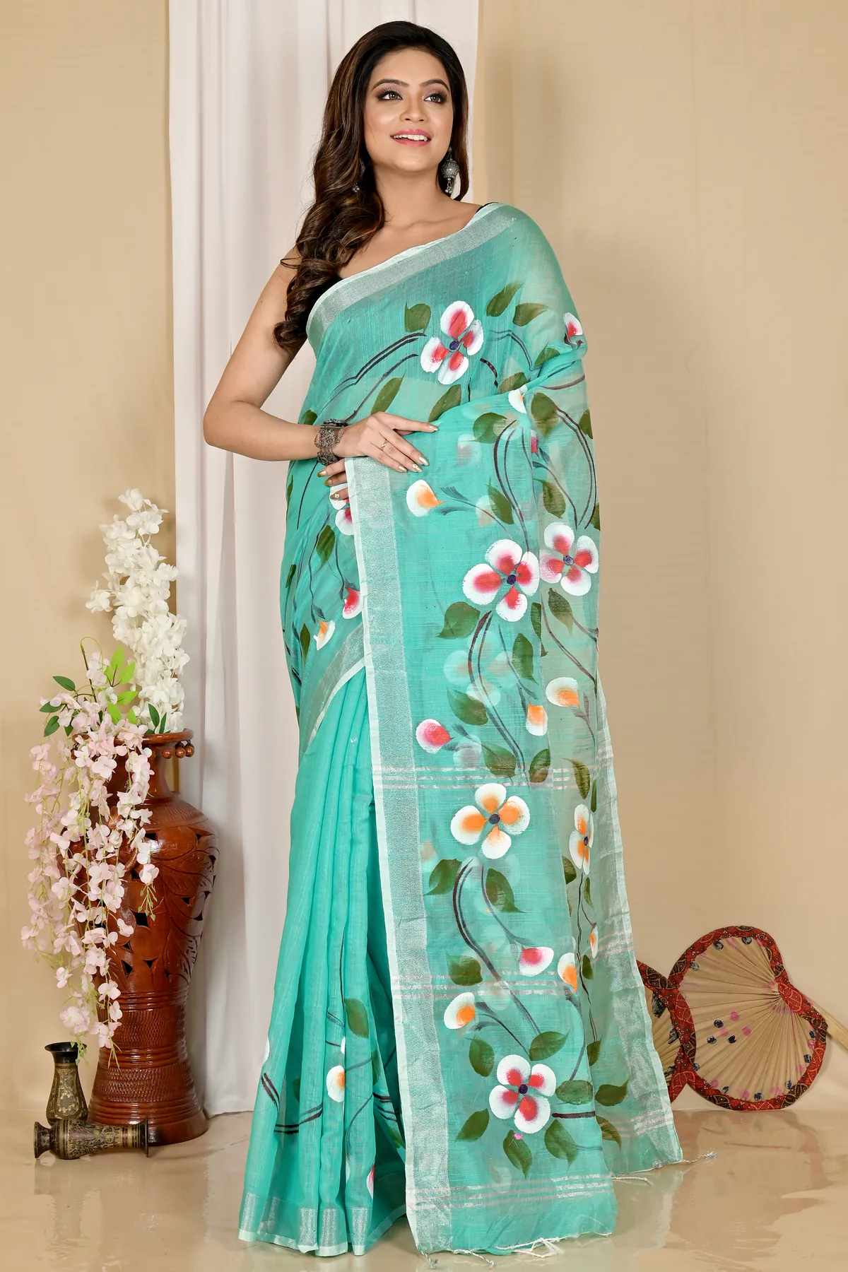 DipDiya Blended Cotton See Green Tanikato Masterfully Woven Hand Painted Sarees