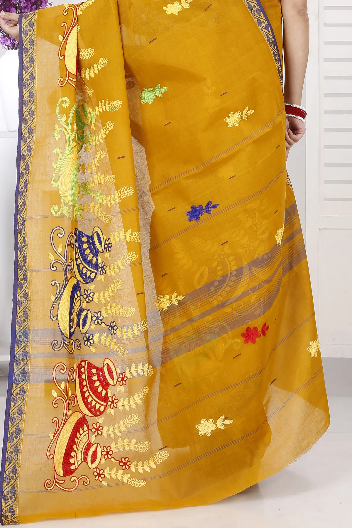 DipDiya Pure Cotton Mustard Yellow Embi Gaela Ghot Wrapped in Heritage Embroidery Tant Sarees