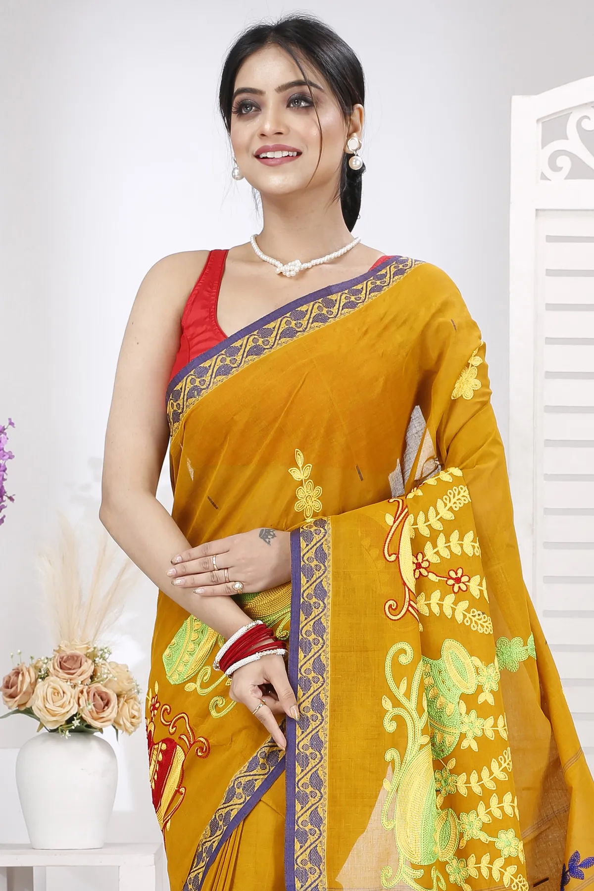 DipDiya Pure Cotton Mustard Yellow Embi Gaela Ghot Wrapped in Heritage Embroidery Tant Sarees
