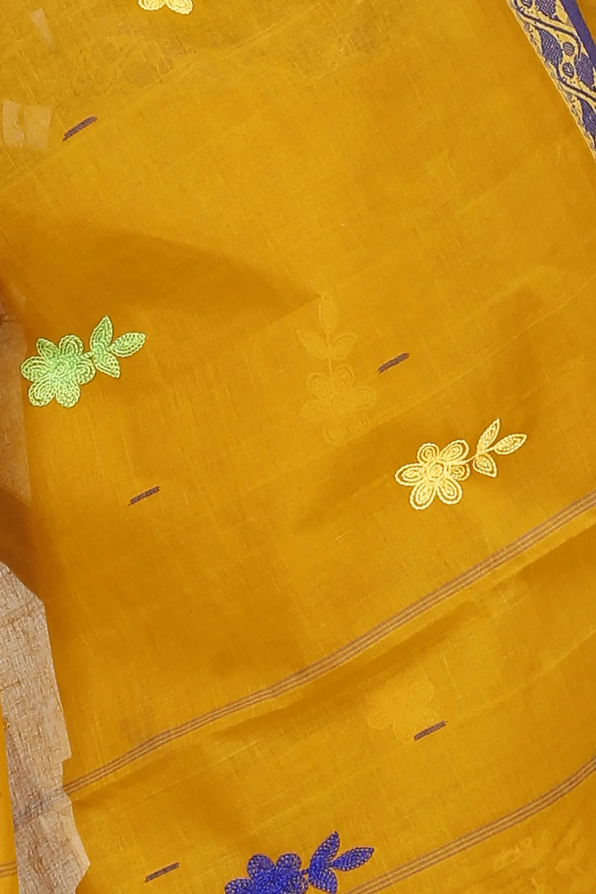 DipDiya Pure Cotton Mustard Yellow Embi Gaela Ghot Wrapped in Heritage Embroidery Tant Sarees