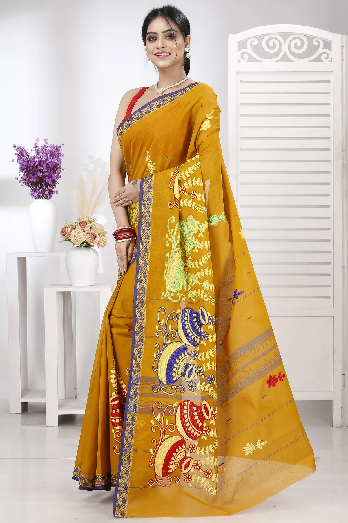 DipDiya Pure Cotton Mustard Yellow Embi Gaela Ghot Wrapped in Heritage Embroidery Tant Sarees