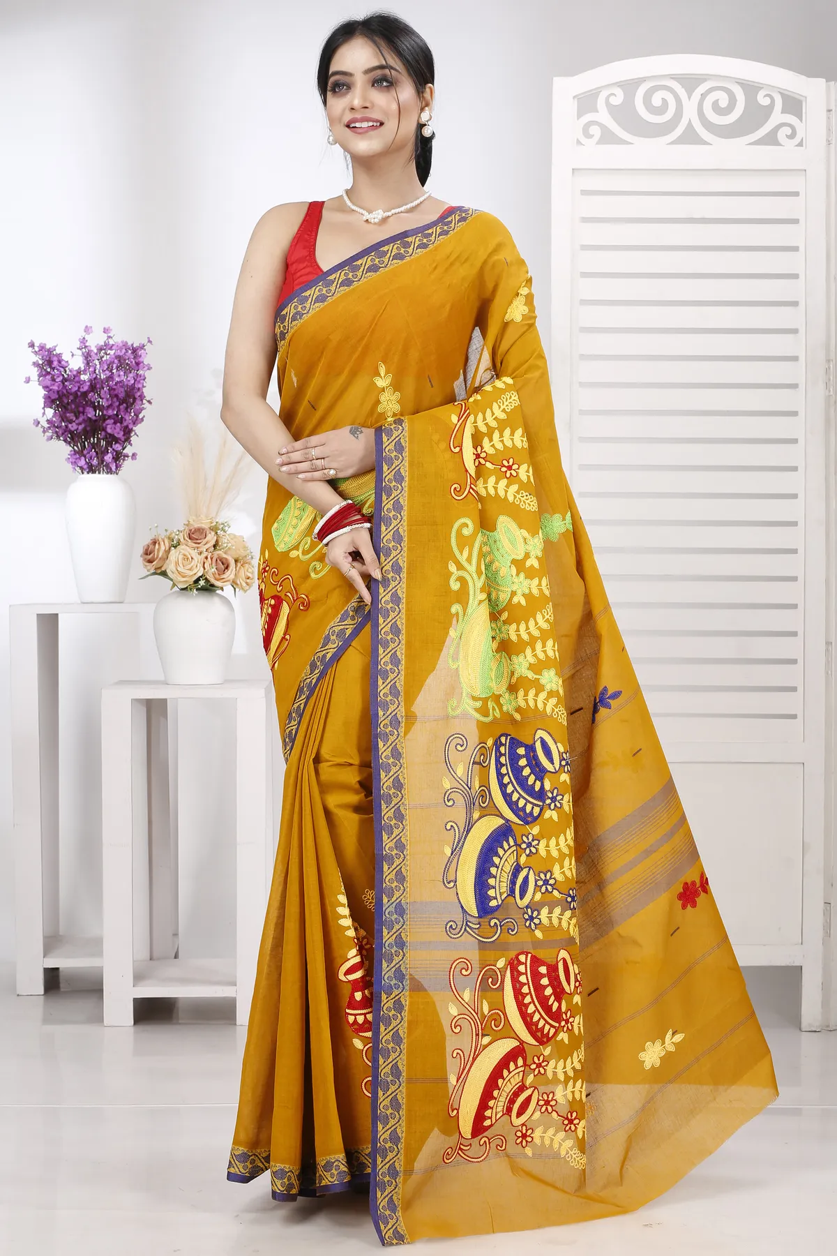 DipDiya Pure Cotton Mustard Yellow Embi Gaela Ghot Wrapped in Heritage Embroidery Tant Sarees