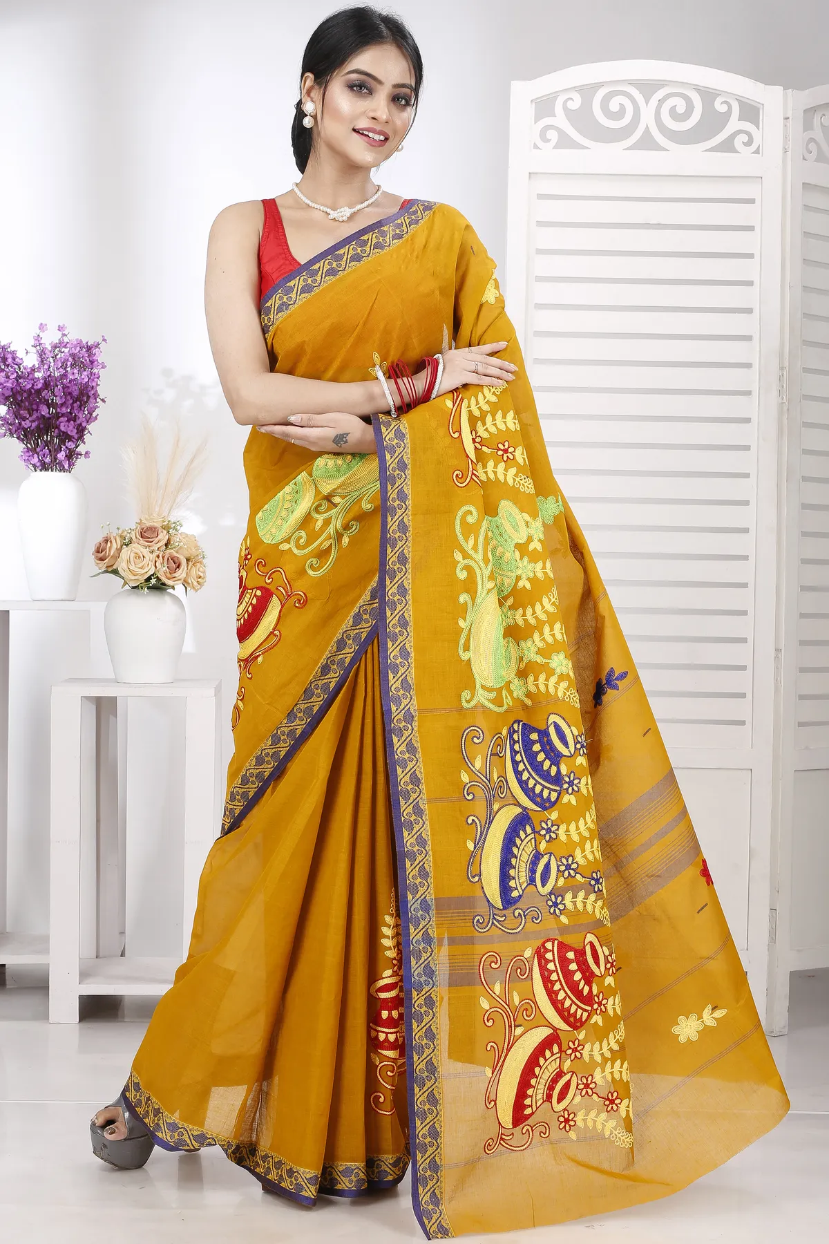 DipDiya Pure Cotton Mustard Yellow Embi Gaela Ghot Wrapped in Heritage Embroidery Tant Sarees