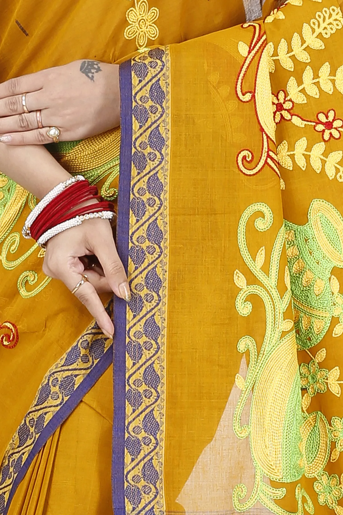 DipDiya Pure Cotton Mustard Yellow Embi Gaela Ghot Wrapped in Heritage Embroidery Tant Sarees