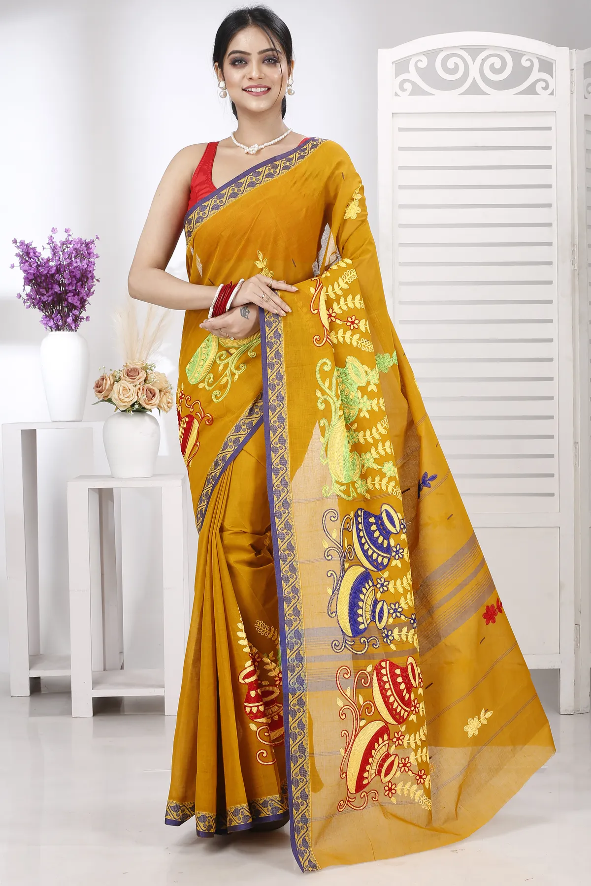 DipDiya Pure Cotton Mustard Yellow Embi Gaela Ghot Wrapped in Heritage Embroidery Tant Sarees