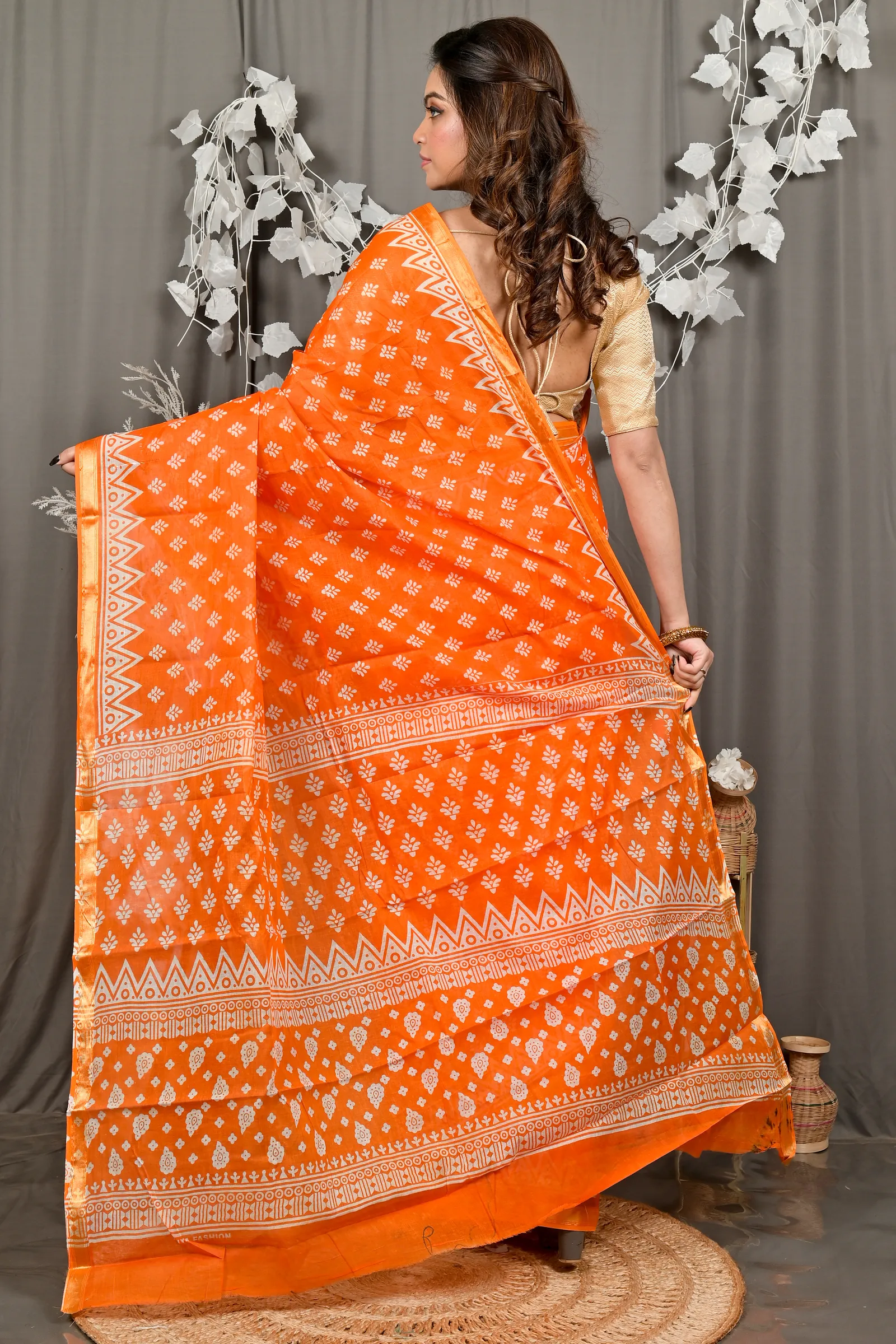 DipDiya Pure Cotton Orange Febasi Artisan Crafted Batik Print Sarees