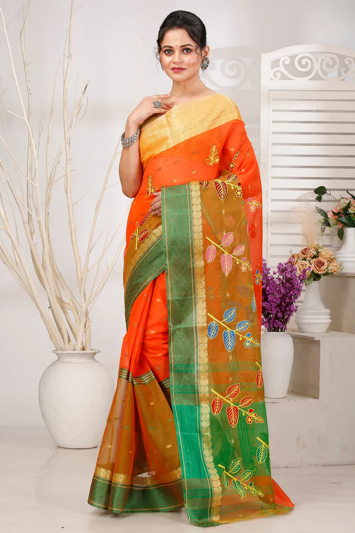 DipDiya Pure Cotton Orange Green Embi Ganga Pata Wrapped in Heritage Embroidery Tant Sarees