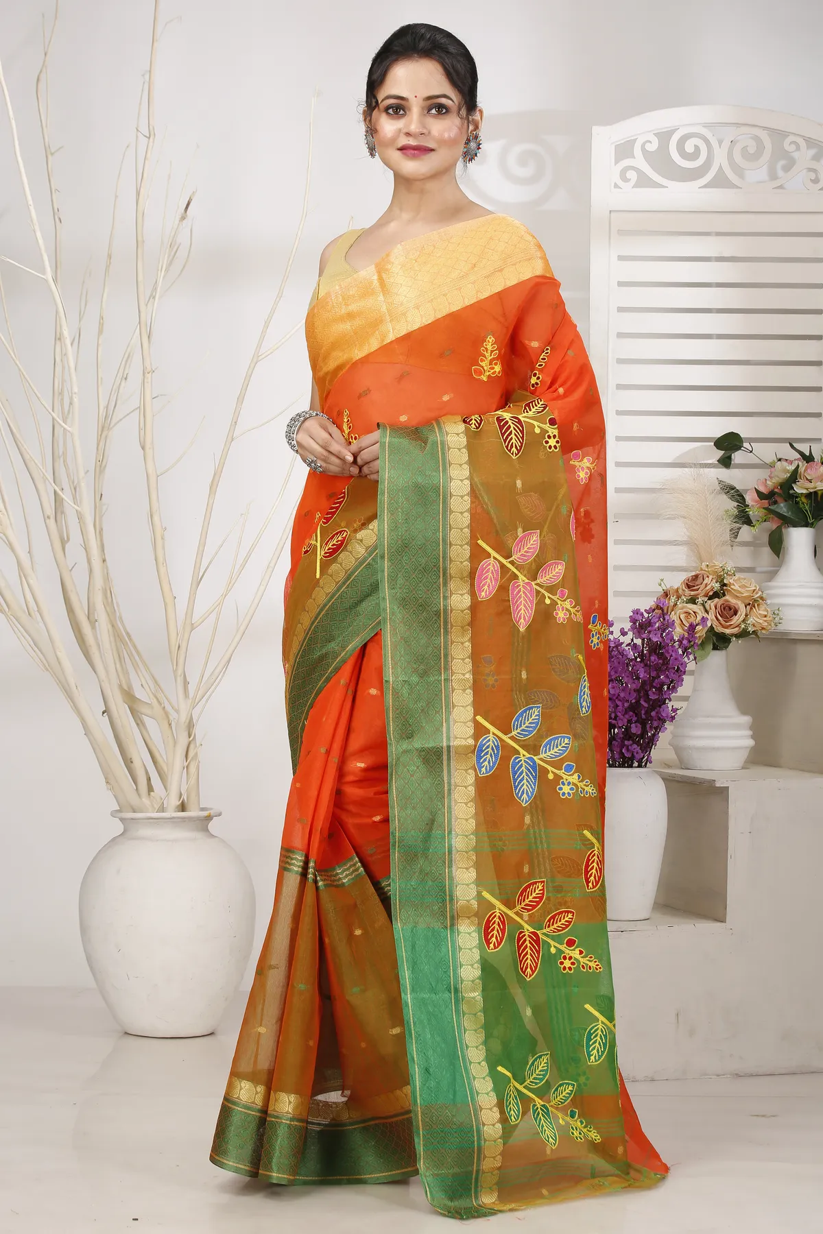 DipDiya Pure Cotton Orange Green Embi Ganga Pata Wrapped in Heritage Embroidery Tant Sarees