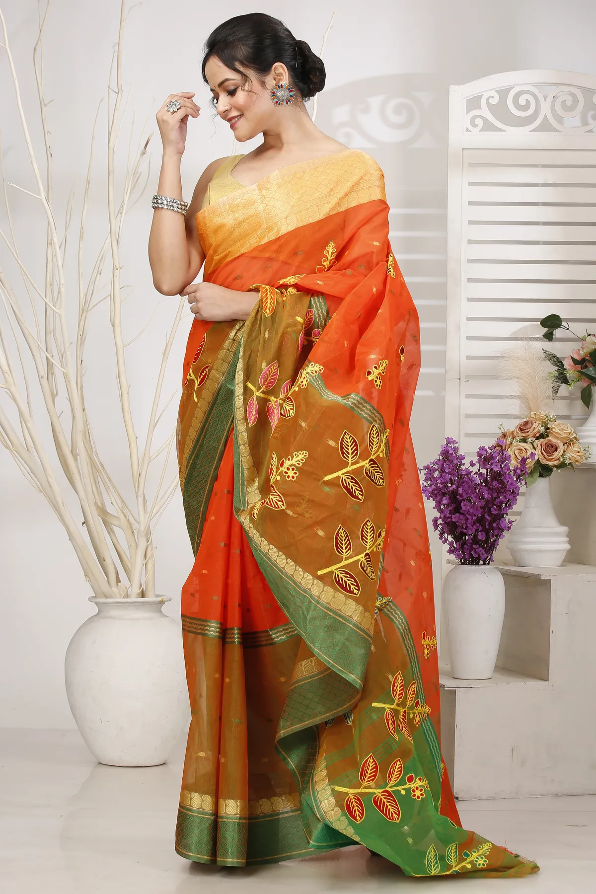 DipDiya Pure Cotton Orange Green Embi Ganga Pata Wrapped in Heritage Embroidery Tant Sarees