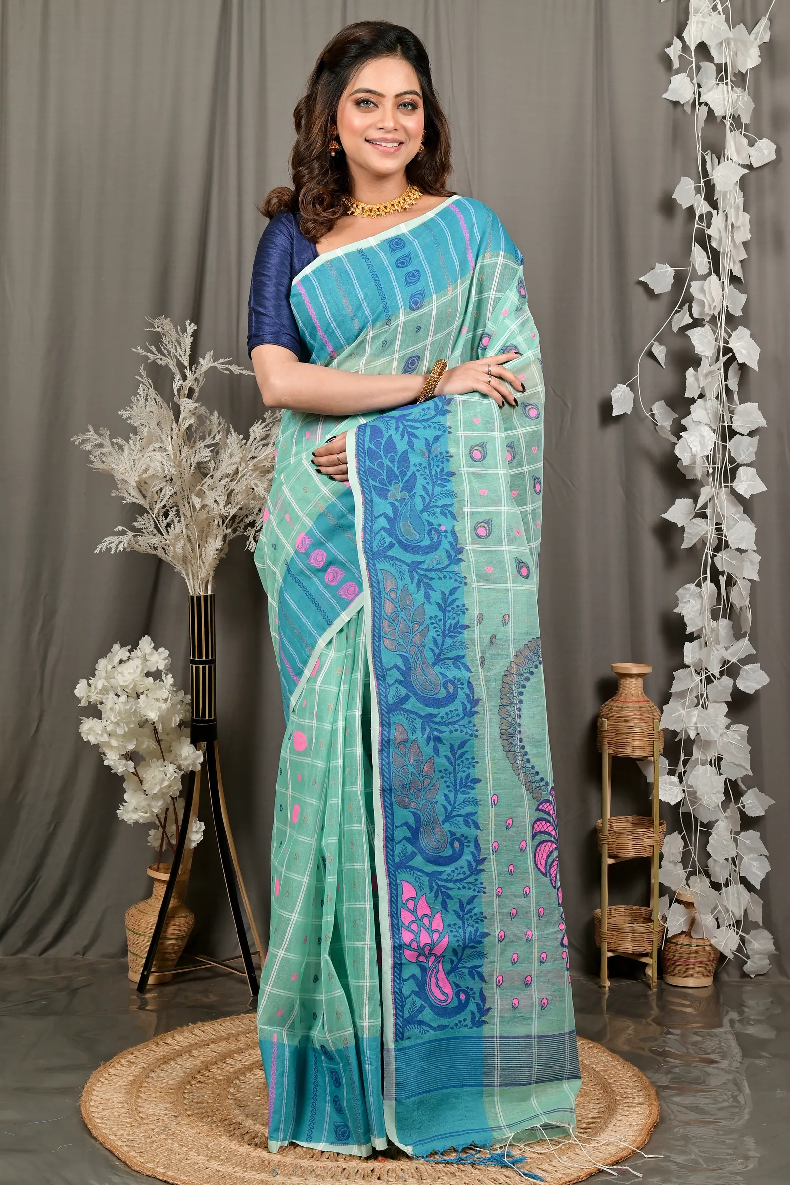 DipDiya Pure Cotton See Green Dhrubi Wrapped in Heritage Jamdani Sarees