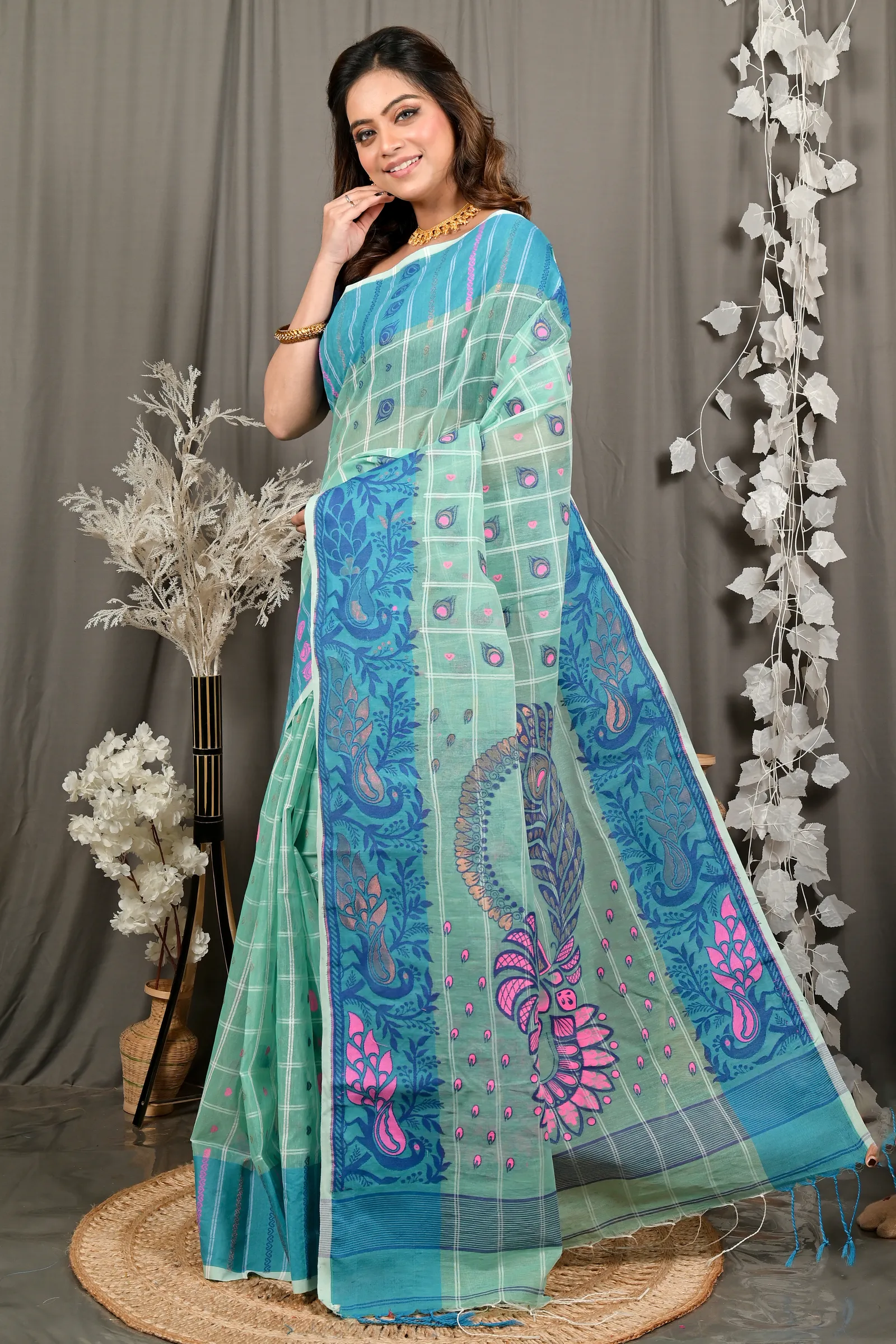 DipDiya Pure Cotton See Green Dhrubi Wrapped in Heritage Jamdani Sarees