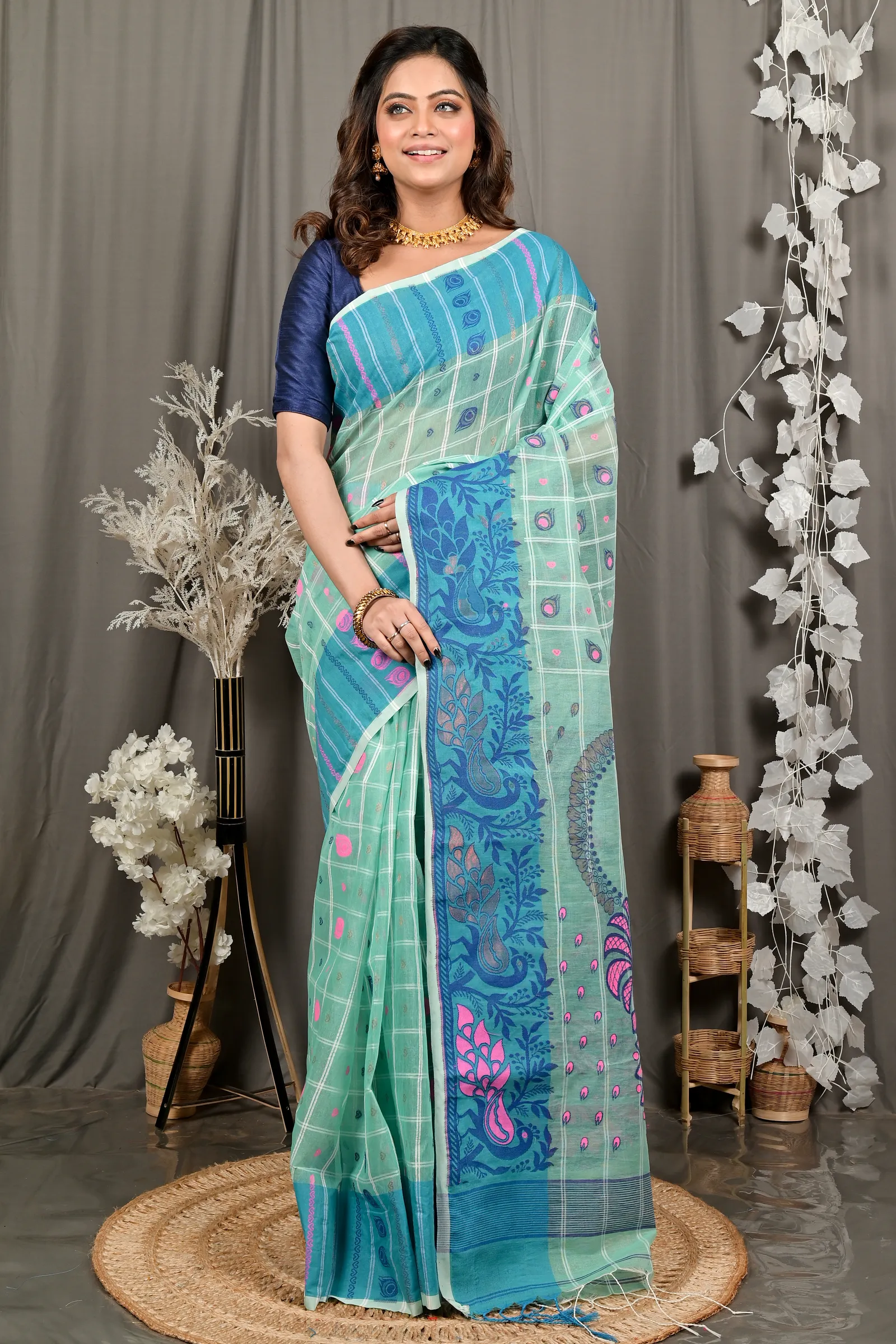 DipDiya Pure Cotton See Green Dhrubi Wrapped in Heritage Jamdani Sarees