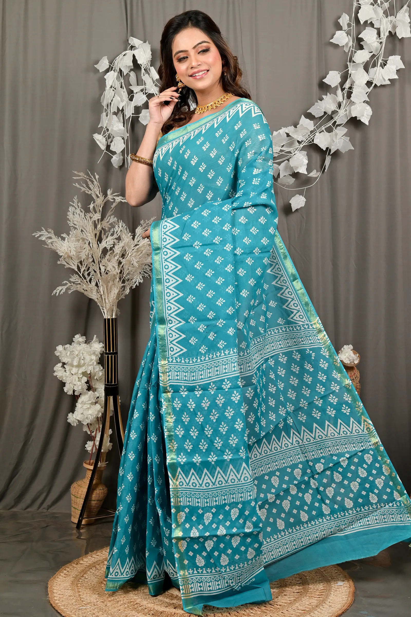 DipDiya Pure Cotton Sky Blue Febasi A Legacy Woven Batik Print Sarees